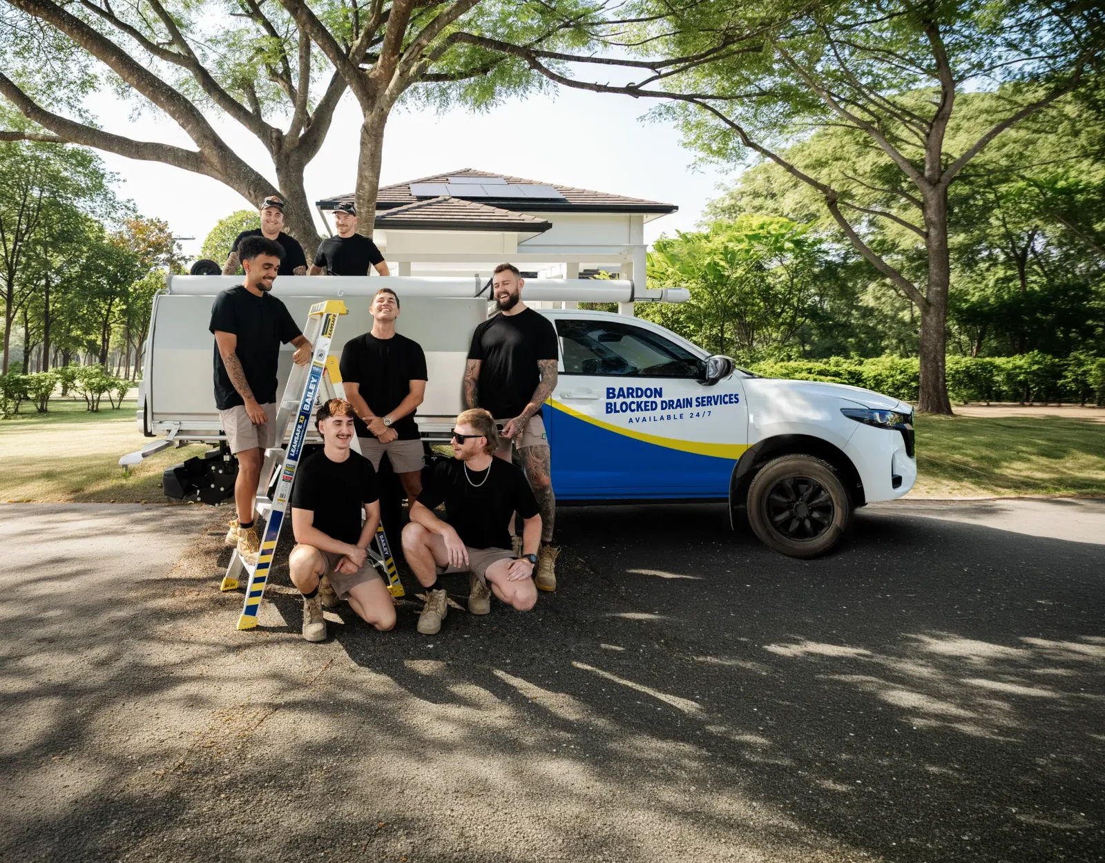 Bardon Blocked Drain Services ute and team